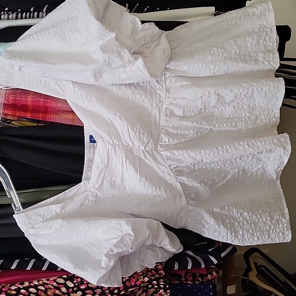 Pouf sleeve smock back peplum top
